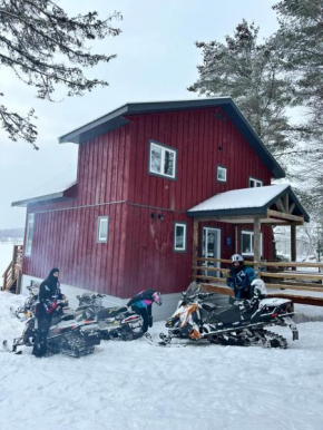 New build, luxurious, 4 plus bedrooms, 2 and a half baths, waterfront chalet, SNOWMOBILE trail access, ample parking & ICE FISHING SHACK